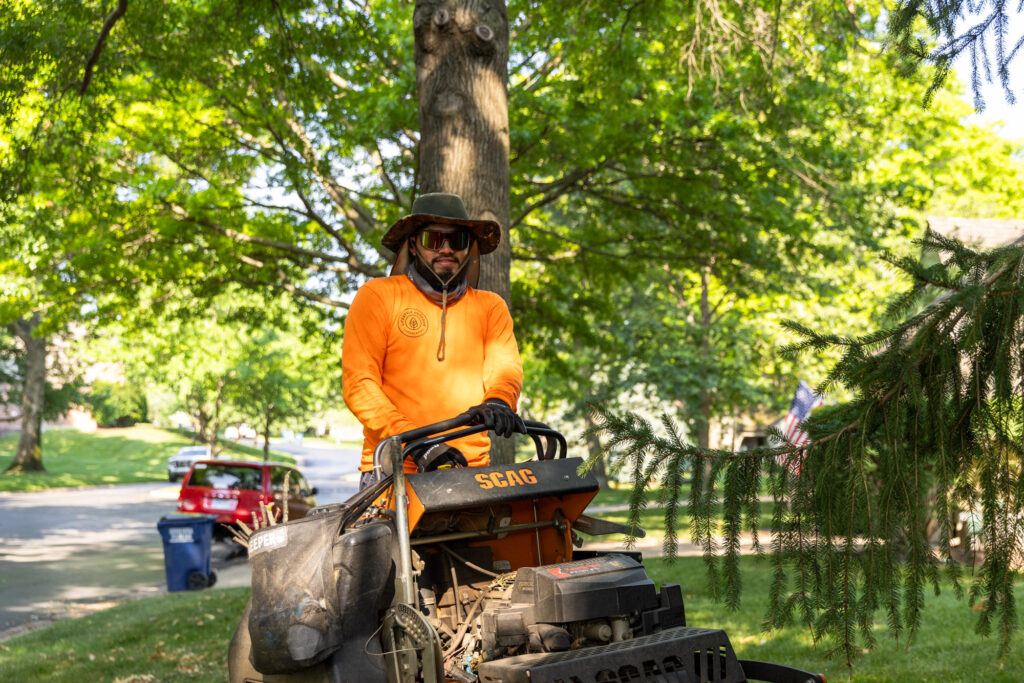A team member of our Residential Lawn Mowing Service in Overland Park